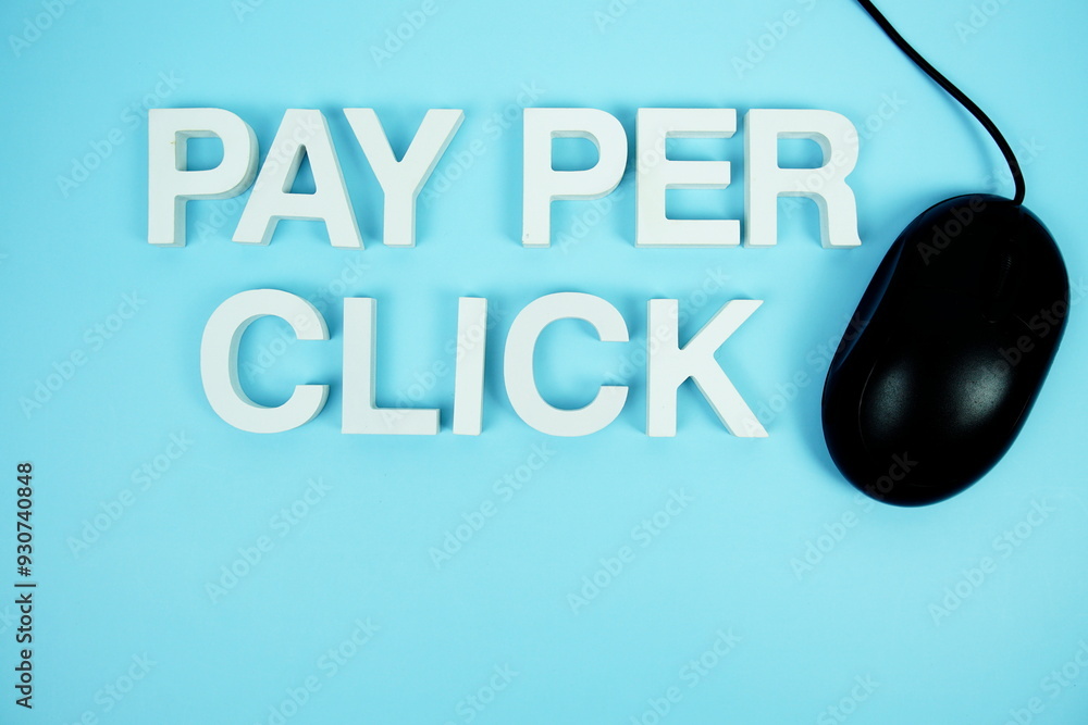 Poster pay per click alphabet letters and optical mouse top view on blue background