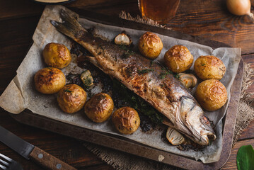 Sea Bass Stuffed with Sorrel and Baked with New Potatoes