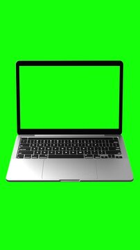 Hovering laptop template with green screen on the display for vertical videos.