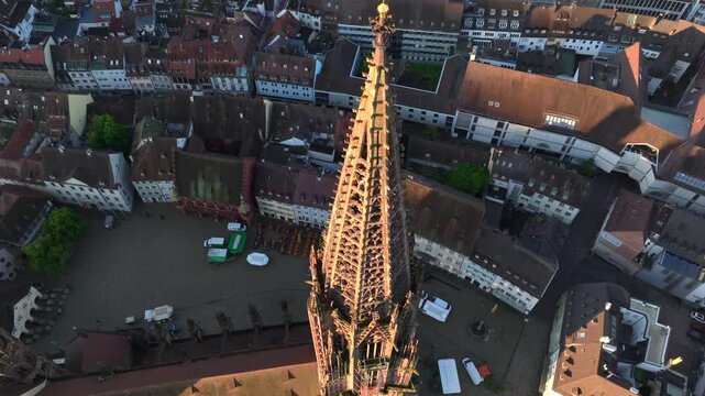 Freiburger Dom Close up Drone Shot made at Morning in Freiburg im Breisgau, Germany at Sunrise. Cathedral in Freiburg