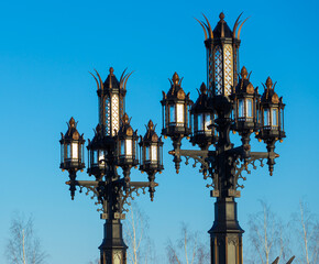 Vintage street lamps at sunset