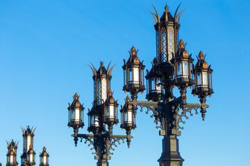 Vintage street lamps at sunset