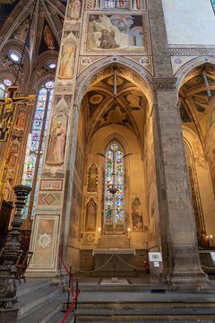 Florence, Italy - Aug 19, 2021: Bardi chapel with Giotto's frescoes and stained glass in Santa Croce Basilica