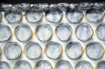 Colorful rainbow bubble wrap for protection closeup