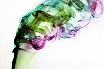 Colorful smoke swirls and twists on a white background contrast