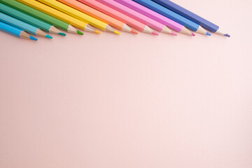 Colored pencils on colored background. Back to school concept. Draw