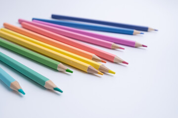 Colored pencils on colored background. Back to school concept. Draw