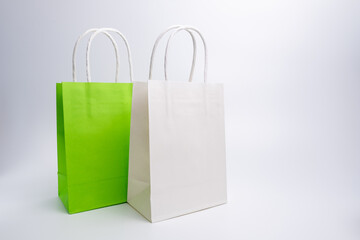 Kraft paper bag on a light background. Delivery and shopping concept. Packaging template mockup
