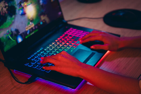 Cropped photo of girl hands arms enjoy modern gadget battle video game indoors house apartment room