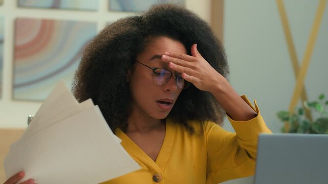 African American businesswoman woman female business girl sweaty office worker computer work tired suffer high hot temperature overheating heat cooling refresh blowing papers air conditioner broken