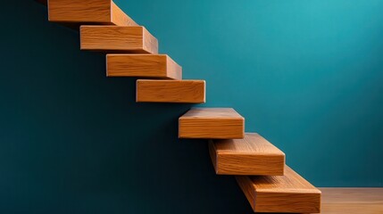 Modern wooden staircase against a vibrant blue wall, showcasing sleek design and craftsmanship in an artistic interior space.