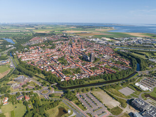 Zierikzee, Zeeland, city aerial overview in Zeeland, The Netherlands. Oosterschelde estuary in the background.