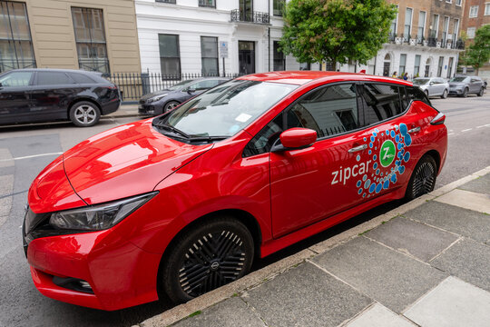 London, England, UK - July 25, 2024: Zipcar vehicle parked on a London street. Zipcar is an American car-sharing company and a subsidiary of Avis Budget Group.