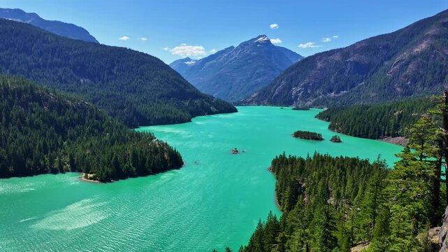 Landscape of mountain peak and Diablo lake. Nature landscape. Diablo Lake in North Cascades National Park. Scenic nature view over Diablo lake. Diablo lake with mountain landscape. Touristic place