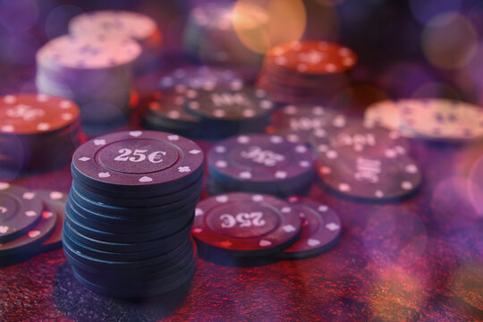 Poker chips on dark background