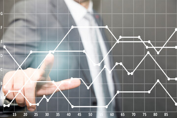 businessman hand working with modern technology and digital layer effect as business strategy concept