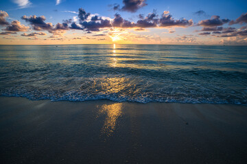 Sunset background. Ocean sundown sky for background. Sea waves for backdrop. Sun over sea. Ocean waves background. Sunset time.
