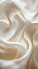 Obraz premium Close-up of flowing ivory silk fabric