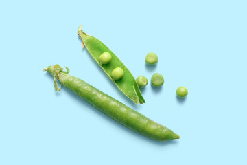 Green peas on blue background