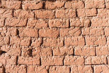 Texture of earth and adobe wall with cracks and grooves in the Andes mountain range