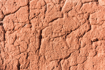 Texture of earth and adobe wall with cracks and grooves in the Andes mountain range