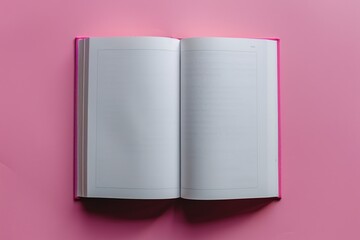An open book with blank pages on a pink background, symbolizing potential and creativity.