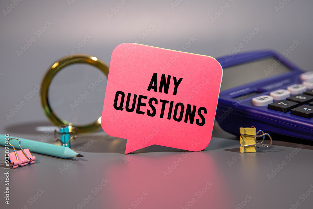 Poster notepad with text any question on yellow background.
