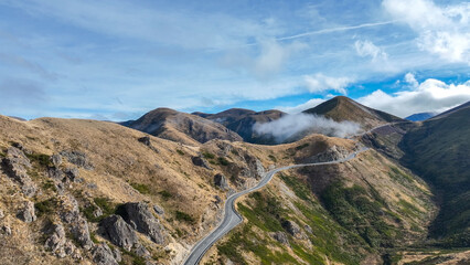 Aerial view of the mountains shrouded in cloud in Torlesse Tussocklands Park