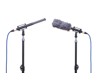 A professional-grade shotgun microphone on a isolated white background, a high-quality audio...