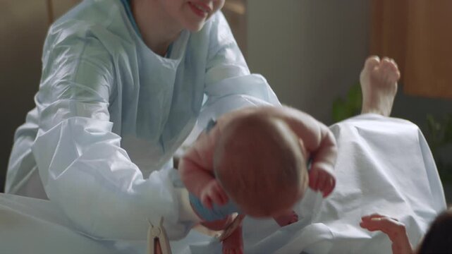Right after childbirth in the hospital baby is on mother's chest
