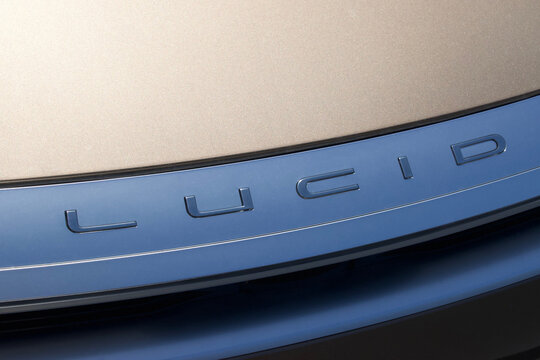 Gold Lucid Logo Car Front End, Newark, California, May 24, 2023, at Lucid Motors Headquarters, close up shot.