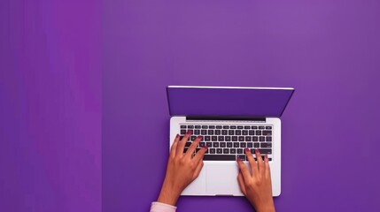 Fototapeta premium Laptop on Purple Background