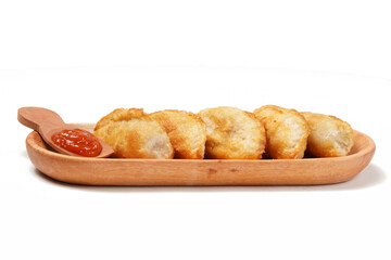 Fried stuffed Cireng, a traditional Indonesian snack filled with seasoned beef fat or jando,...
