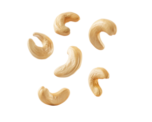 A collection of cashew nuts arranged on a white background.