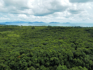 Obraz premium Aerial view of Koh Mak with a tropical forest and the sea and Koh Chang in the horizon, Thailand