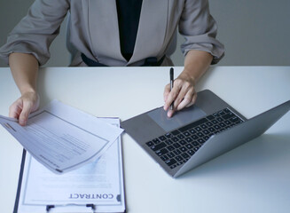 Business woman employer holds resume of job applicant to analyze data before job interviews. Regarding personnel recruitment