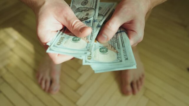 Barefoot Affluence: An Intimate Look at Counting Dollar Bills amid Lavish Comfort
