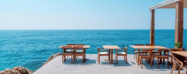 A seaside cafe with tables overlooking the ocean, perfect for a summer morning coffee, summer sea, relaxation, coastal vibes