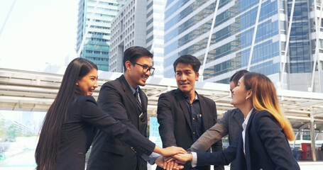 Fototapeta premium Multiethnic Teamwork friendship group brainstorming togetherness. Business people team holding hands Solidarity. Diversity business partner people teamwork holding hands together power of tag team