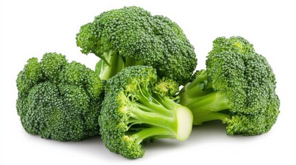 Broccoli and broccoli pieces isolated on white background
