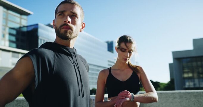 Runner man, woman and check smart watch for time, progress or target for workout, training and fitness. Couple, exercise partner and iot clock for reading stats, development and challenge in street
