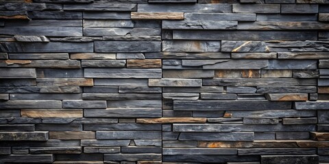 Dark slate stone wall texture with black and gray tones, perfect for architectural backgrounds , stone, wall, texture