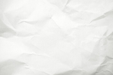 Recycled white creased paper background from a paper packaging. Crumpled white paper texture concept
