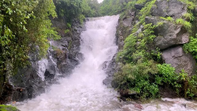 ghatmatha waterfall in monsoon at the start of Kumbharli ghat in Konkan, Maharashtra, India