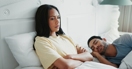 Angry, sleeping and couple in bed at house with divorce for infidelity, cheating or affair. Upset,...