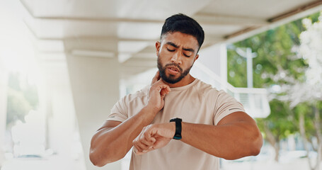 Fitness, smart watch and man check pulse after training, exercise or workout progress on app. Heart...