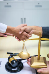 A lawyer is seated at a desk in an office, reviewing and signing legal documents. The scene captures a professional setting focused on contracts, finance,  providing legal advice to clients.