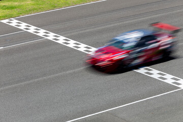 Motion blur race car racing on speed track, Car race on the international circuit race track...