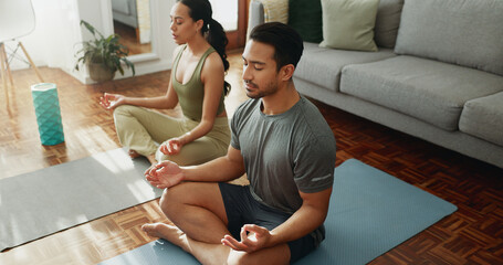 Couple, yoga and lotus with meditation in home for holistic wellness, mindfulness or relax on floor...
