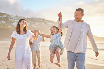 Beach, father and mom with child for swing, playful and bonding together on vacation in California. Family, dad and mother with girl for walking, game and connection with happy daughter on adventure